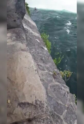 Dude Calmly Swims Off Niagara Falls