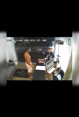 Hotel Guest Makes A Complaint At Reception