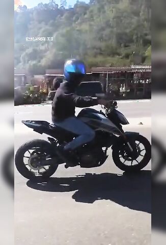 Biker Misjudges The Curve Crashes Into Oncoming Traffic